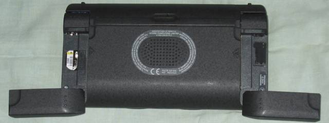 Underside with the SSD covers open; the backup cell is under the white label (photo: Chris Whytehead, CC BY-SA 3.0)