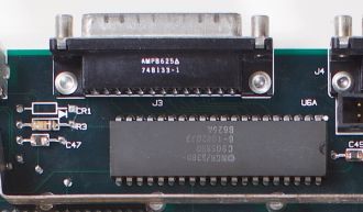Macintosh Plus logic board CR1 behind SCSI connector (Recap-a-Mac)