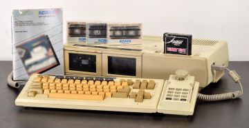 Coleco Adam with keyboard, controller and data packs