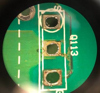 The Q113 position after the MOSFET was removed: the trace at the pad eaten through by electrolyte (Pentium, IRIX Network forum)
