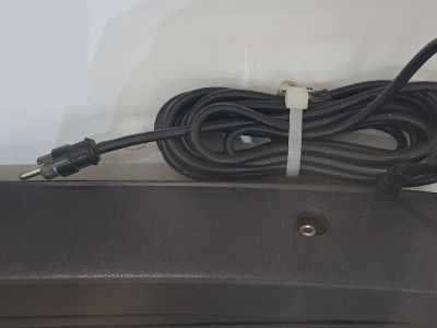 Rear: the game cable with its phono plug and the adapter socket in its recess