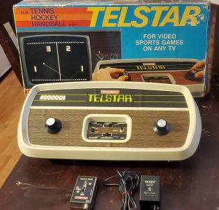 A boxed Telstar with its switch box and a Model 6041 adapter