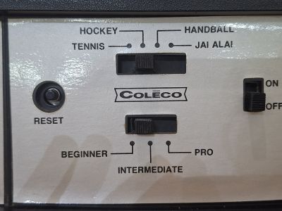 The centre panel of a unit labelled TENNIS, HOCKEY, HANDBALL, JAI ALAI