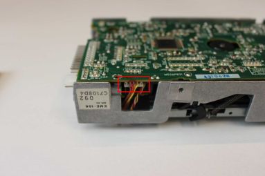 The 4-way connector (boxed); the drive label reads EME-156